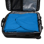 turquoise packing folder in bag
